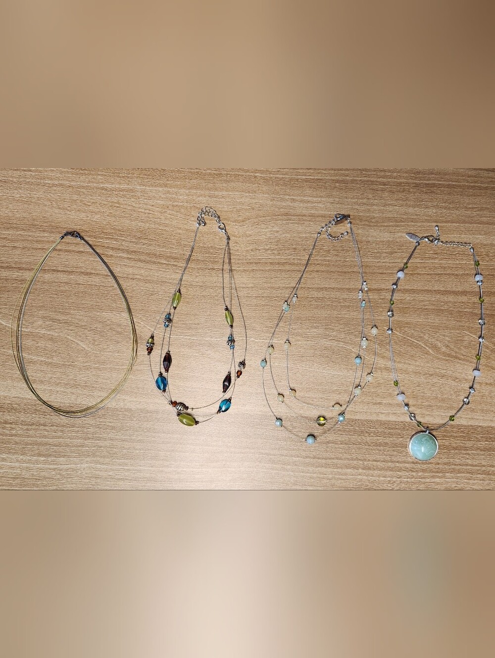 4 Multi-Strand Beaded Necklaces in Blue, Green and Brown